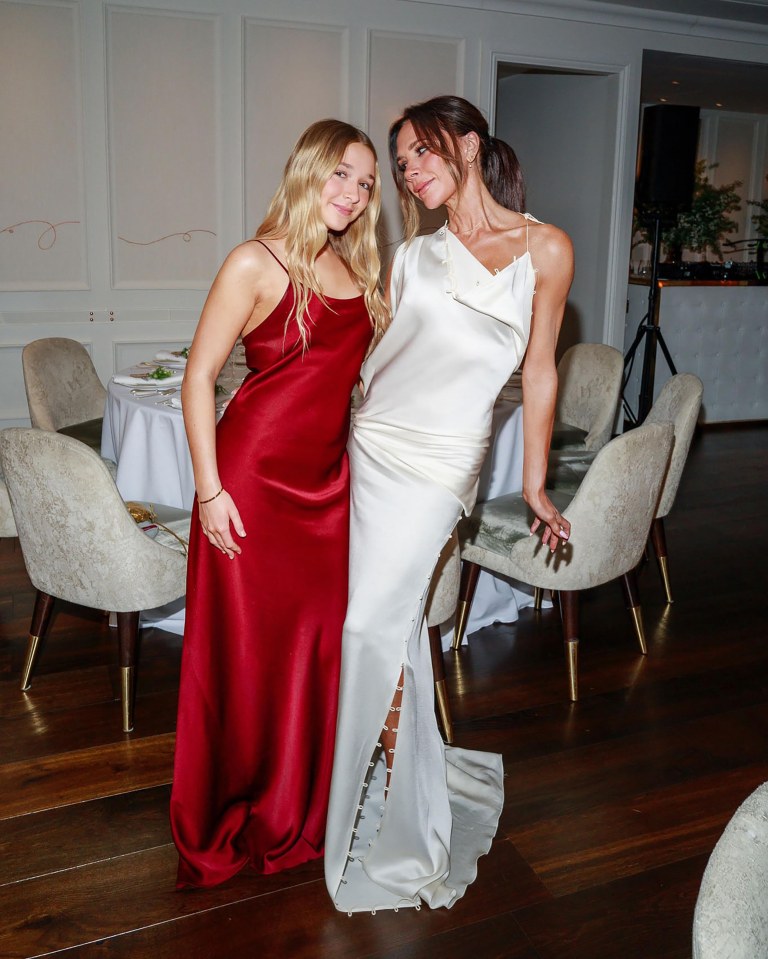 Victoria Beckham and her daughter in matching dresses.