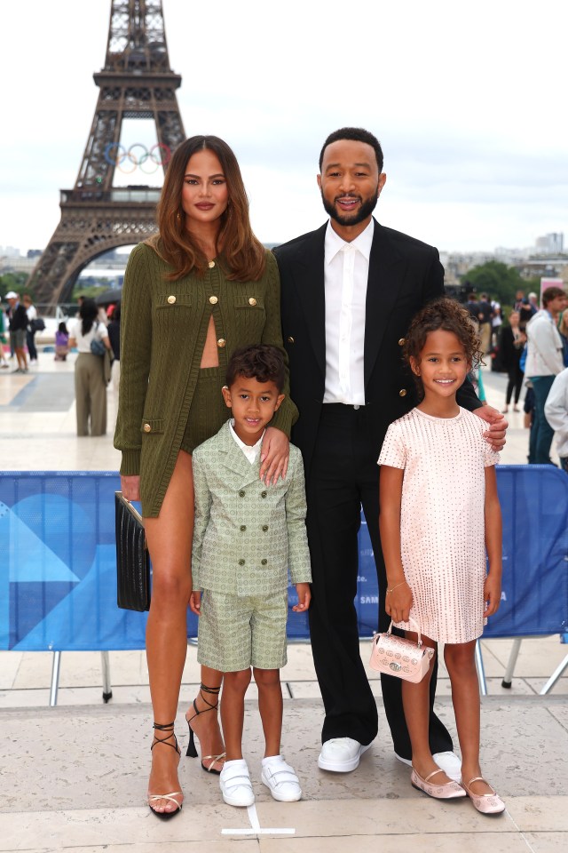 Chrissy Teigen, John Legend, and their children at the Paris 2024 Olympics opening ceremony.