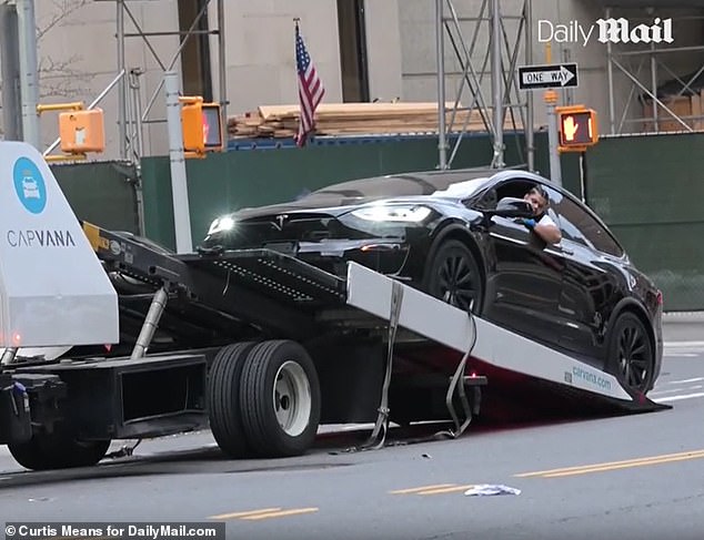 DailyMail.com witnessed her handing the $100,000 car over to a representative from the online auto sales giant Carvana in New York City over the weekend