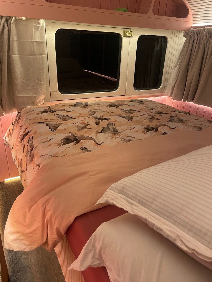 Bed in a converted school bus.