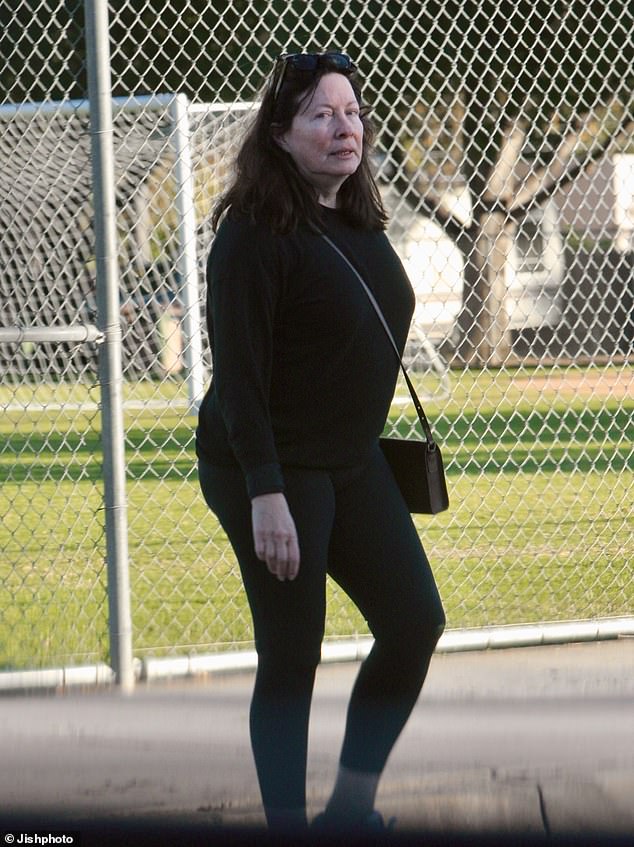 Linda, pictured in December 2024, looked nearly unrecognizable after ditching both her blonde locks and the glitz of Hollywood for a more peaceful life in Ojai, California