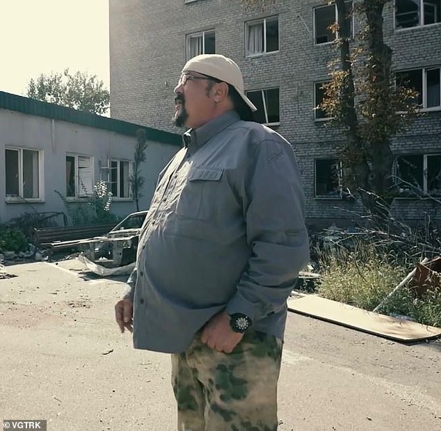 The illusive martial artist's appearance marks yet another show of solidarity with Russia, which he has vocally supported in recent years - even appearing in a Russian propaganda documentary (pictured) about the war in Ukraine