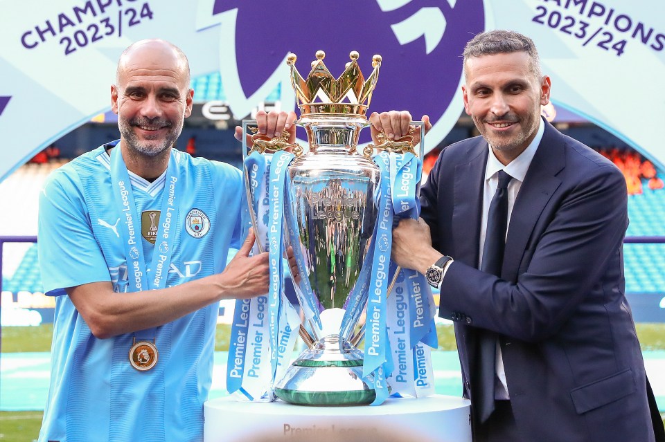 Khaldoon Al Mubarak and Pep Guardiola with the Premier League trophy.