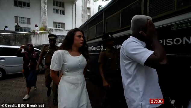 Charlotte May Lee, 21, being taken to a prison van in Colombo this morning