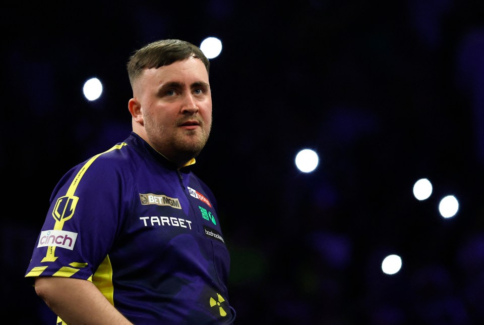 Luke Littler during a darts match.