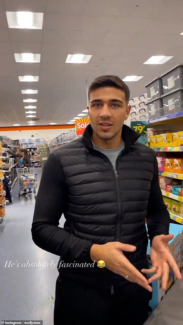Bargain hunter: Panning the camera to her boyfriend, Molly-Mae told her fans: 'I think Tommy's enjoying our little trip to Home Bargains'