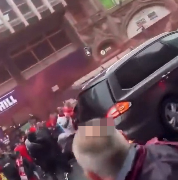 Aftermath of a car plowing into a Liverpool FC parade crowd.
