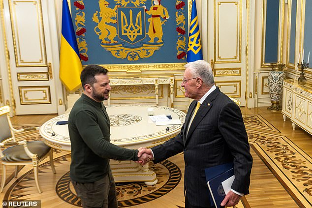 US Special Envoy to Ukraine and Russia Keith Kellogg shakes hands with Ukrainian President Volodymyr Zelensky, amid Russia's attack on Ukraine, in Kyiv, Ukraine, February 20, 2025