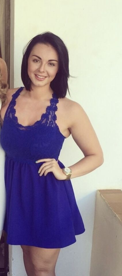 Woman in a blue dress.