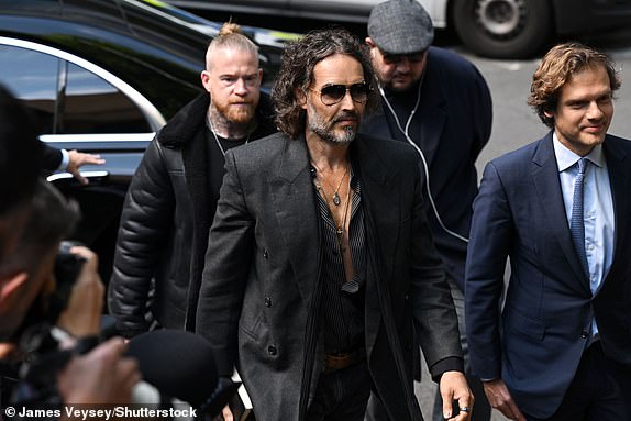 Mandatory Credit: Photo by James Veysey/Shutterstock (15328911a) Russell Brand Russell Brand plea and trial preparation, Southwark Crown Court, London, UK - 30 May 2025 Plea and trial preparation hearing for actor and comedian Russell Brand, 49, charged with rape, indecent assault and sexual assault between 1999 and 2005. Brand faces allegations that he: raped a woman in the Bournemouth area in 1999; indecently assaulted a woman in the Westminster area of London in 2001; orally raped and sexually assaulted a woman in Westminster in 2004; and sexually assaulted a woman in Westminster between 2004 and 2005. The charges relate to four separate women. Detectives began investigating in September 2023 following reporting by The Sunday Times and the Dispatches programme on Channel 4.