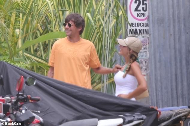 The pair couldn't' stop smiling during the outing