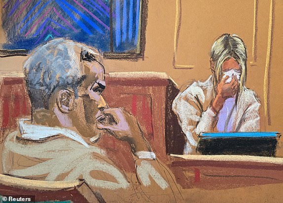 Sean "Diddy" Combs watches as witness "Mia" testifies in Combs' sex trafficking trial in New York City, New York, U.S., May 29, 2025 in this courtroom sketch. REUTERS/Jane Rosenberg