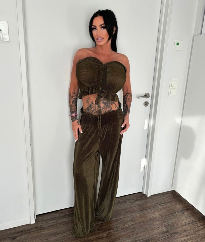 Woman in olive green outfit.