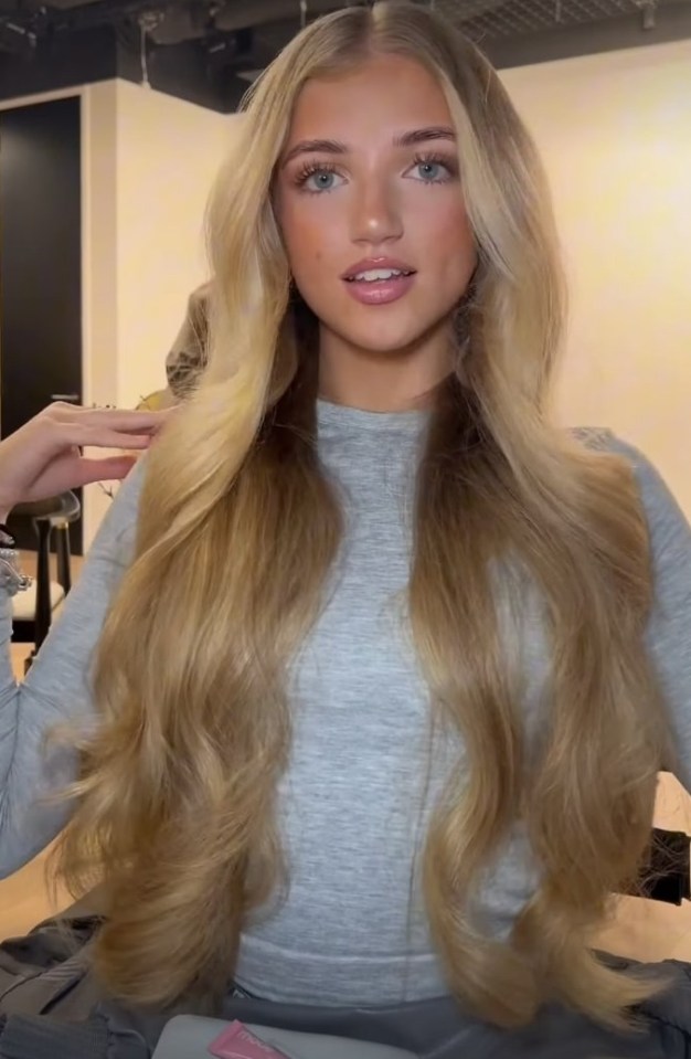Princess Andre showing off her long blonde hair.