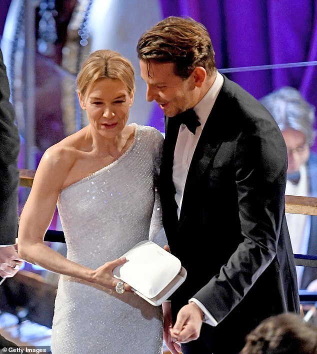 Rene Zellweger and Bradley Cooper attend the 92nd Annual Academy Awards at Hollywood and Highland on February 09, 2020 in Hollywood