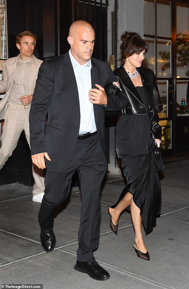 A gentleman walked Dakota out as her brother followed