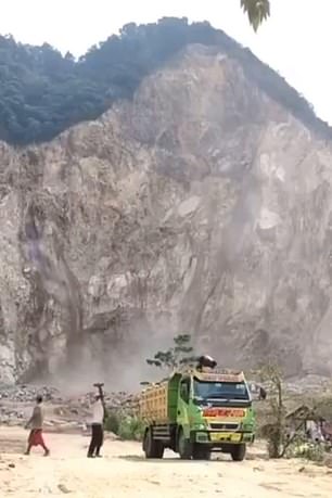 Pictured: The mountain in the beginning stages of the landslide