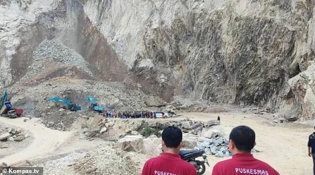 Indonesian news network Kompas TV captured images of of excavators digging around in the rubble looking for survivors