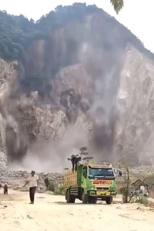 Seconds later, more of the mountain crumbles