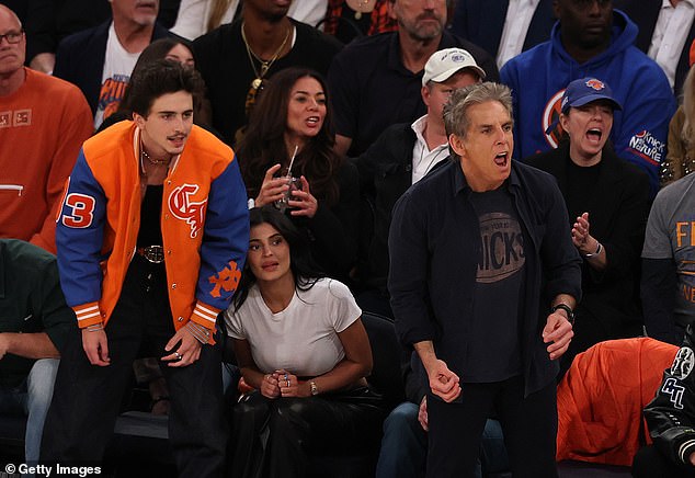 The star-studded front row included Ben Stiller, who got to his feet along with Timothee during one tense part of the game