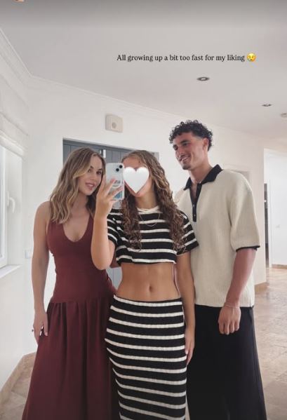 Photo of Kate Ferdinand with her stepson and another person.