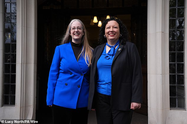Campaigners Helen Joyce (left) and Maya Forstater of Sex Matters smile outside court after the landmark ruling