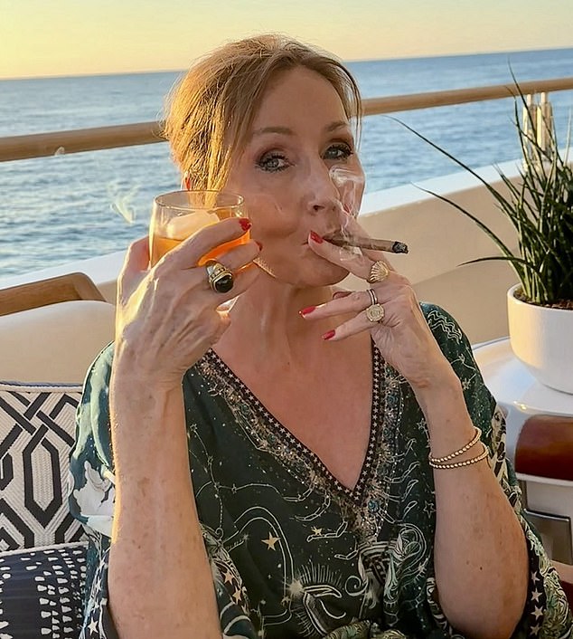 J.K Rowling pictured smoking a cigar to celebrate the Supreme Court ruling a woman is defined by biological sex