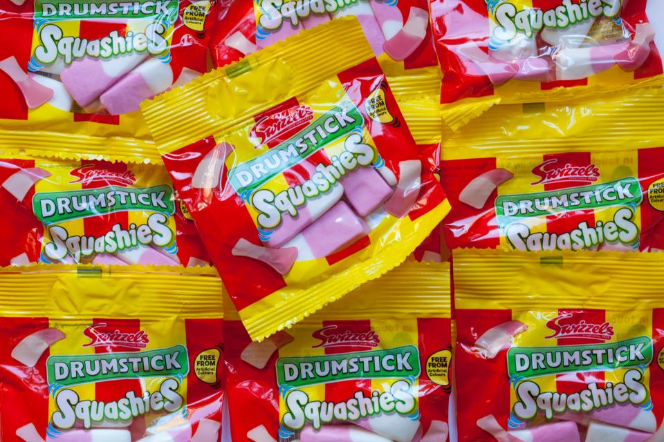 Packets of Swizzels Drumstick Squashies sweets.