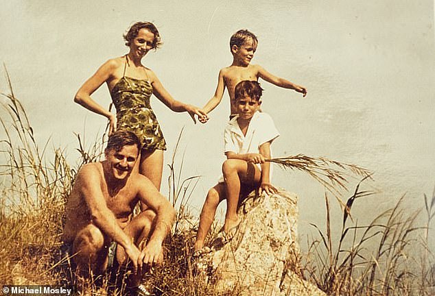 Dr Mosley (top, right) with his parents and brother in Hong Kong in 1962 posing together