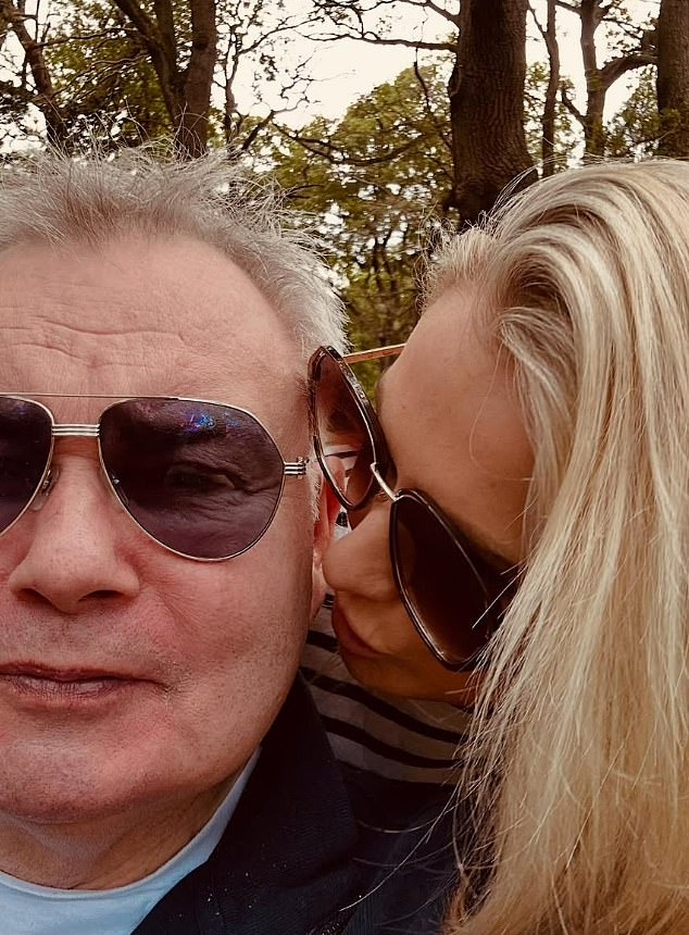 Katie and Eamonn, both sporting sunglasses, looked every bit the happy couple in the snaps as the 43-year-old pecked her new boyfriend on the cheek
