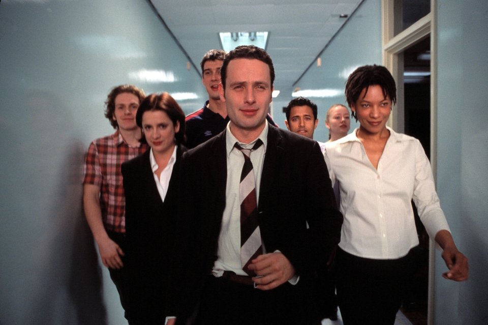 Photo of the cast of Channel 4's Teachers walking down a hallway.