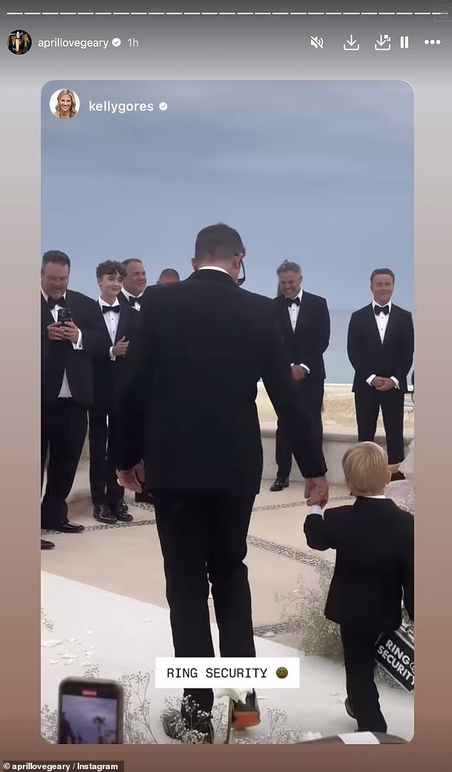 Robin suited up in a black tuxedo and held hands with the couple's son Luca