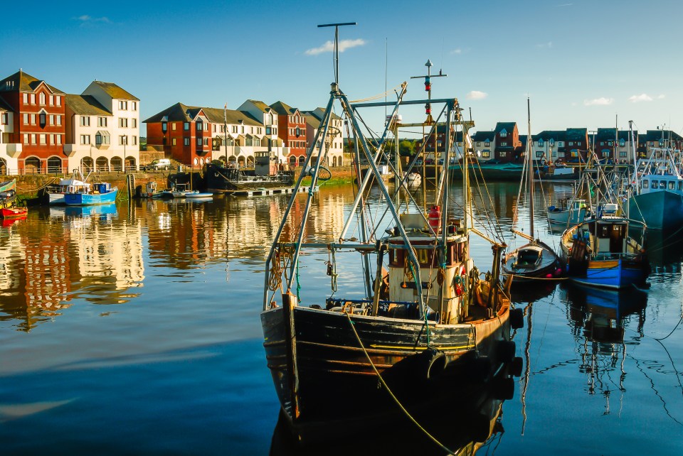 Trawlers in Maryport harbor, Cumbria.