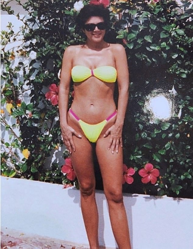 In a yellow two piece while on vacation
