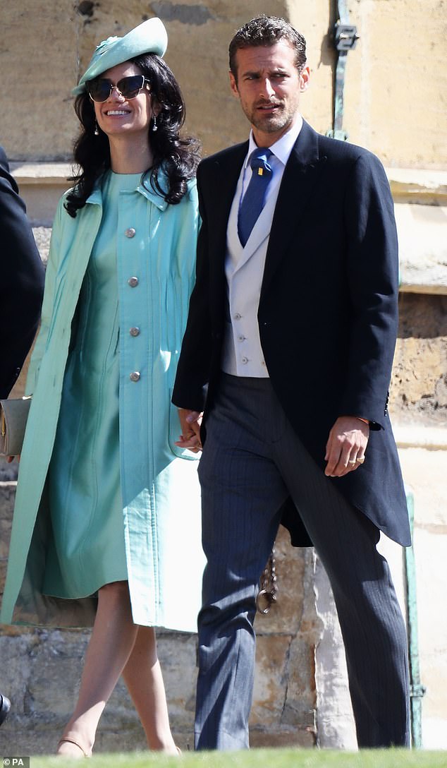Photographer Alexi Lubomirski and his wife arrive at St George's Chapel in Windsor Castle for the wedding of Harry and Meghan