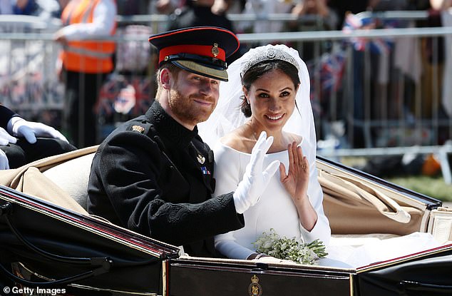 When Meghan thought the crowds were behind her and no one could see them anymore, she turned to Harry and seemingly said, 'Oh f***!' as she put her hand over her chest