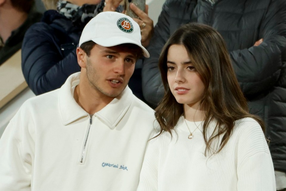 PARIS, FRANCE - MAY 26: Joao Neves of PSG and his girlfriend Madalena Aragao attend day 2 of the 2025 French Open, Roland-Garros 2025, Grand Slam tennis tournament at Roland Garros stadium on May 26, 2025 in Paris, France. (Photo by Jean Catuffe/Getty Images)