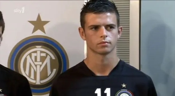 Young man in Inter Milan jersey.