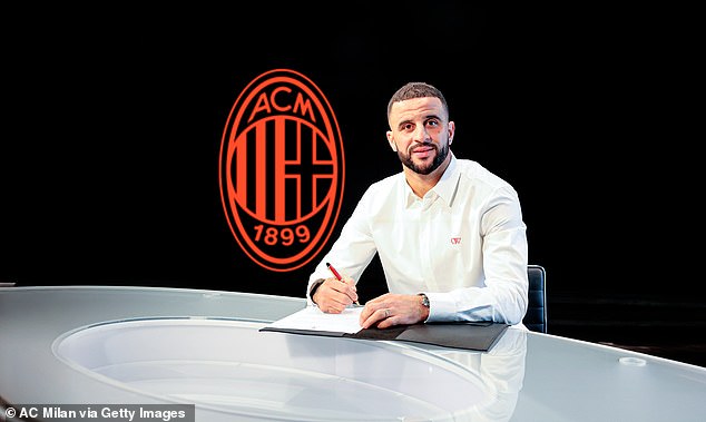 Insiders have told MailOnline his inner circle view his stint in Milan as a 'wasted opportunity', not only for his football career but getting his marriage back on track with Annie (Walker pictured signing his AC Milan contract)