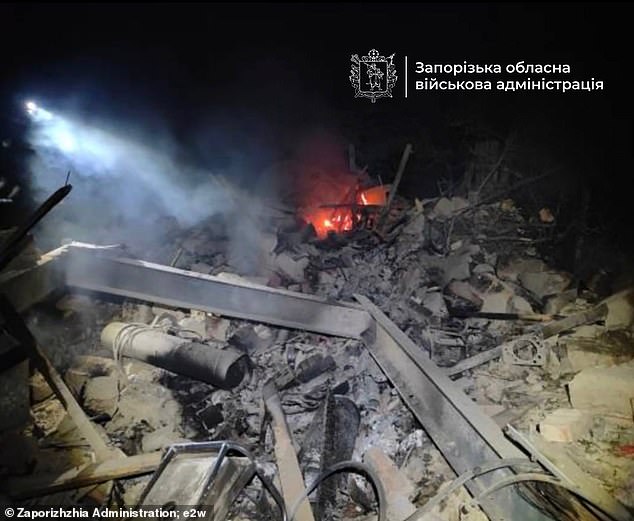 In Russia's latest strikes on civilians, a girl, nine, was killed in Zaporizhzhia region, while a 16 year old was wounded. Pictured: A building reduced to rubble following the strikes in the Zaporizhzhia region today