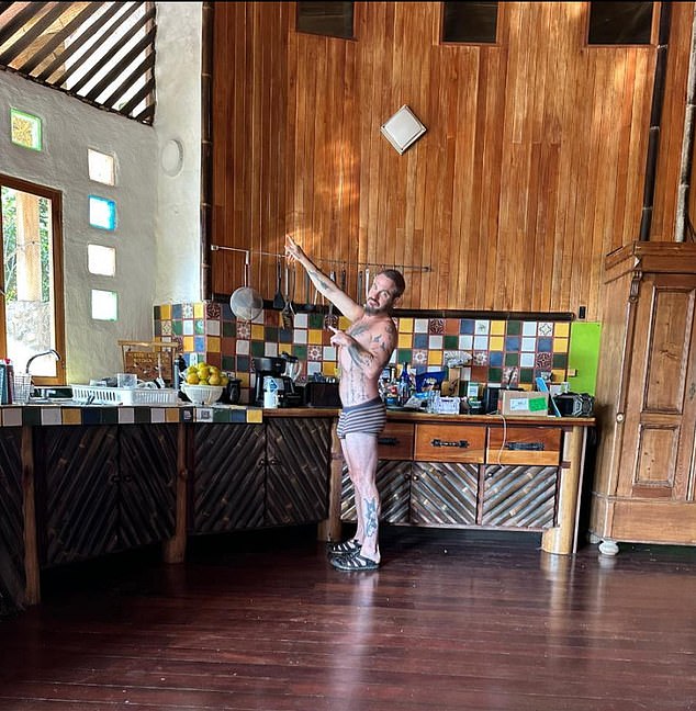 Adam - pictured in the couple's spacious Costa Rica apartment - ranted about Keir Starmer, the Tories, Reform and the NHS as he said goodbye to Britain