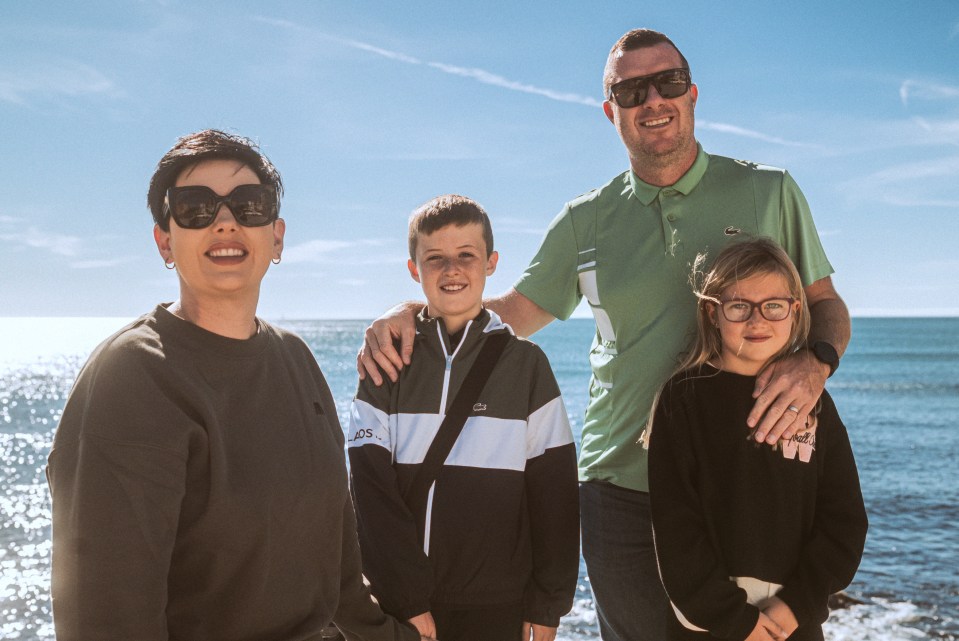 Family portrait by the sea.