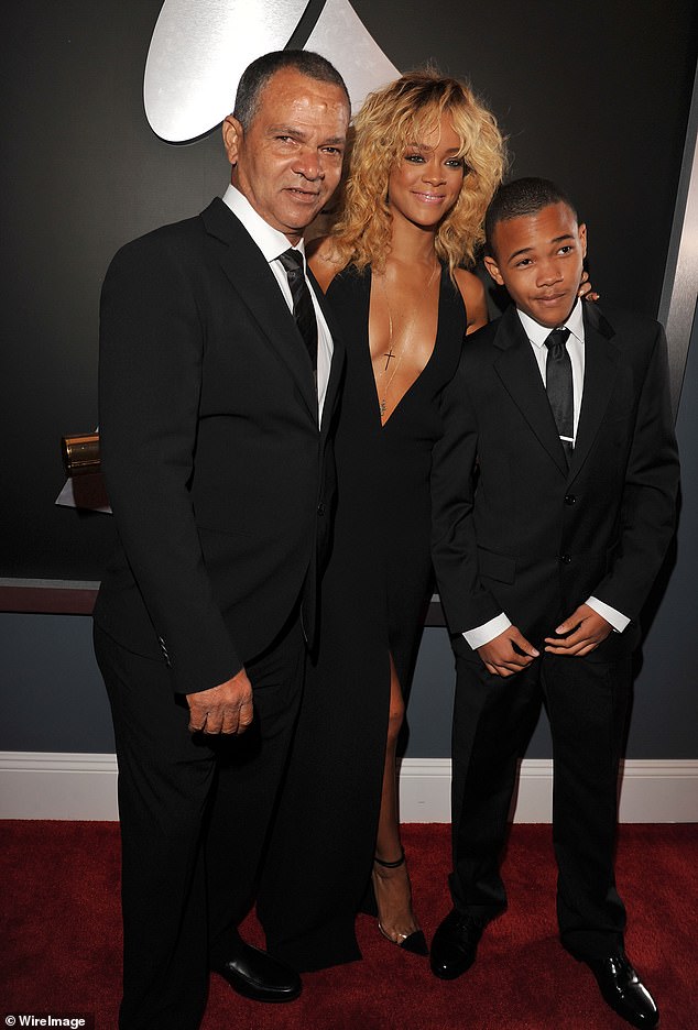 Rihanna, her father, and brother Rajad Fenty in 2012