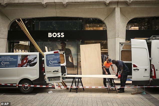 Over in Paris, shops are setting up barricades in case there is a backlash at PSG losing