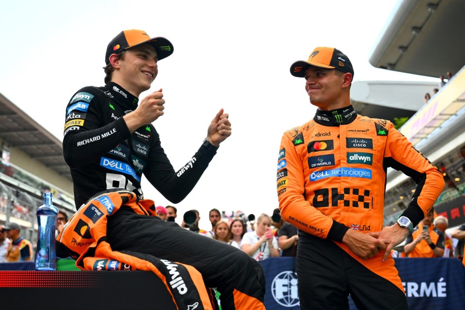 BARCELONA, SPAIN - MAY 31: Pole position qualifier Oscar Piastri of Australia and McLaren and Second placed qualifier Lando Norris of Great Britain and McLaren talk in parc ferme during qualifying ahead of the F1 Grand Prix of Spain at Circuit de Barcelona-Catalunya on May 31, 2025 in Barcelona, Spain. (Photo by Mark Sutton - Formula 1/Formula 1 via Getty Images)