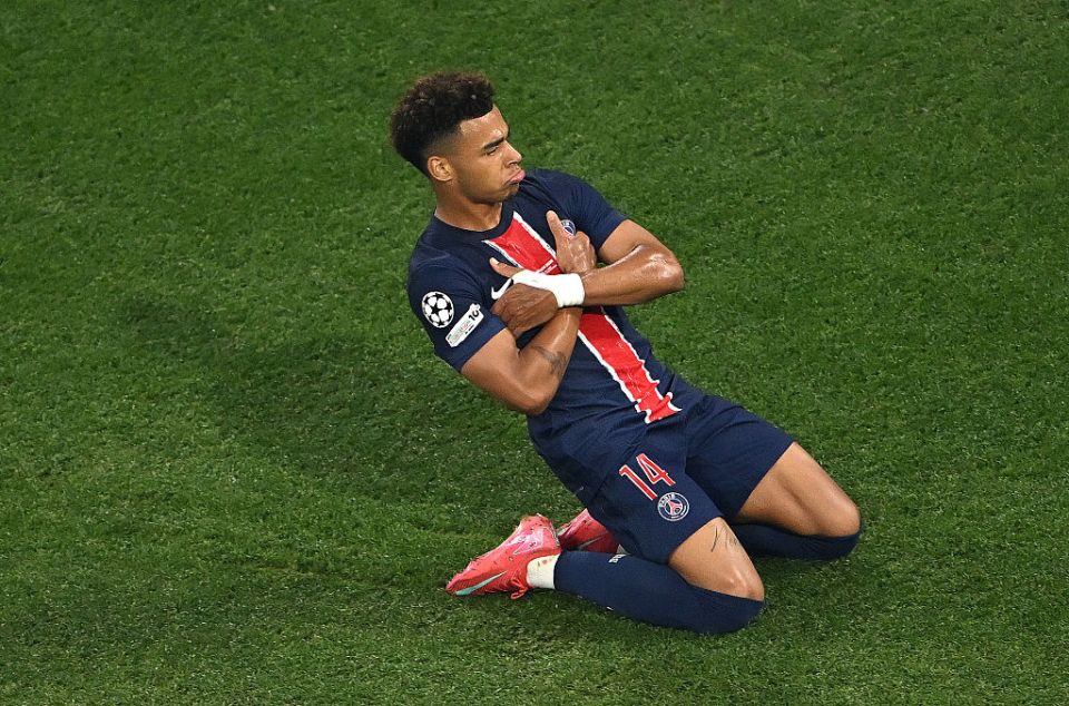 MUNICH, GERMANY - MAY 31: Desire Doue of Paris Saint-Germain celebrates scoring his team's second goal during the UEFA Champions League Final 2025 between Paris Saint-Germain and FC Internazionale Milano at Munich Football Arena on May 31, 2025 in Munich, Germany. (Photo by Dan Mullan/Getty Images)