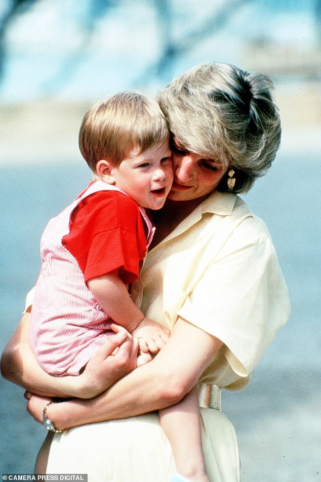 A young Prince Harry with his mother Princess Diana during a visit to Majorca in 1987
