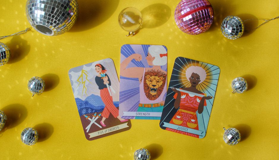 Illustration of three tarot cards (Five of Swords, Strength, Justice) surrounded by disco balls on a yellow background.