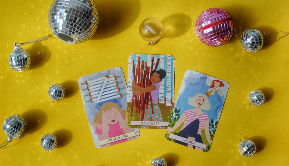 Illustration of three tarot cards (Nine of Swords, Ten of Wands, Judgement) surrounded by disco balls.
