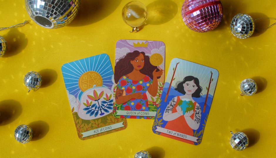 Three tarot cards (Ace of Coins, Queen of Coins, Two of Wands) surrounded by disco balls.